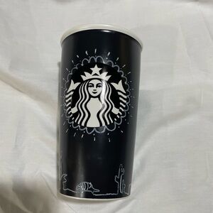 Starbucks black ceramic travel mug with the mermaid design with black lid